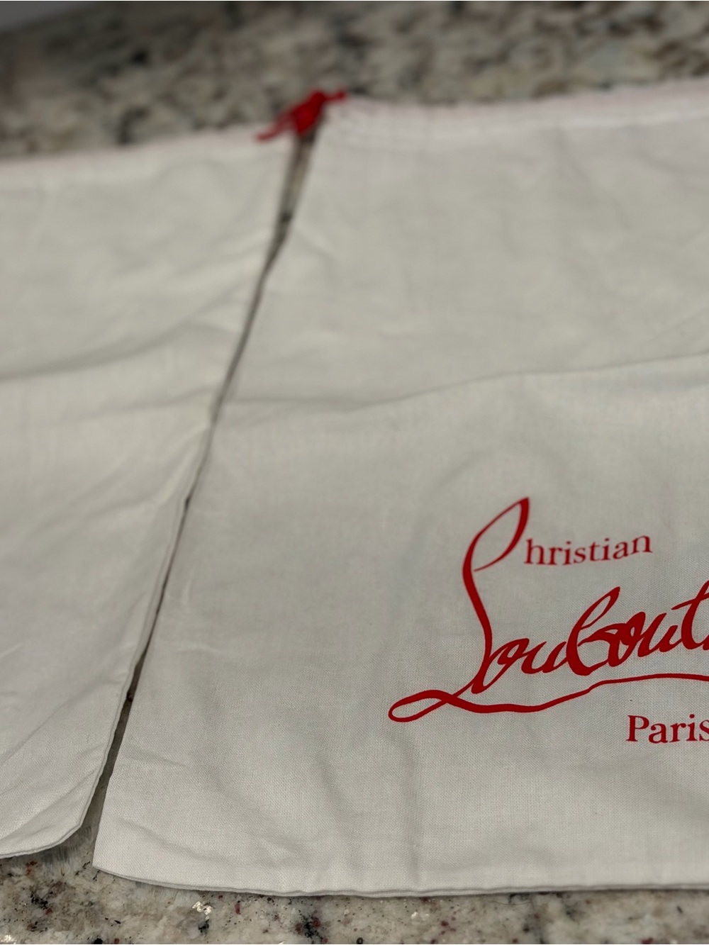 Christian Louboutin shoes dust bag
